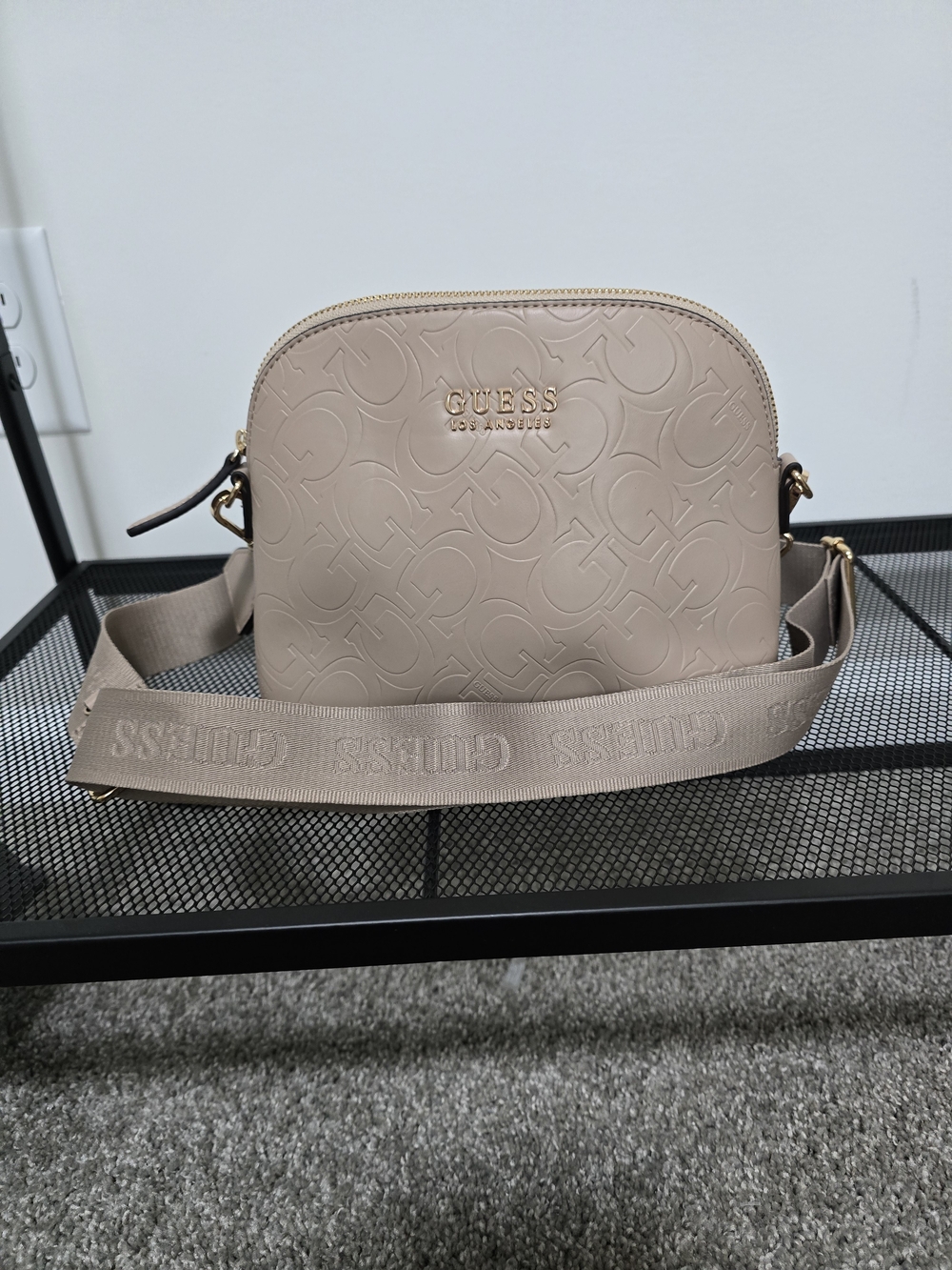 GUESS Embossed Logo Crossbody Bag in Light Beige